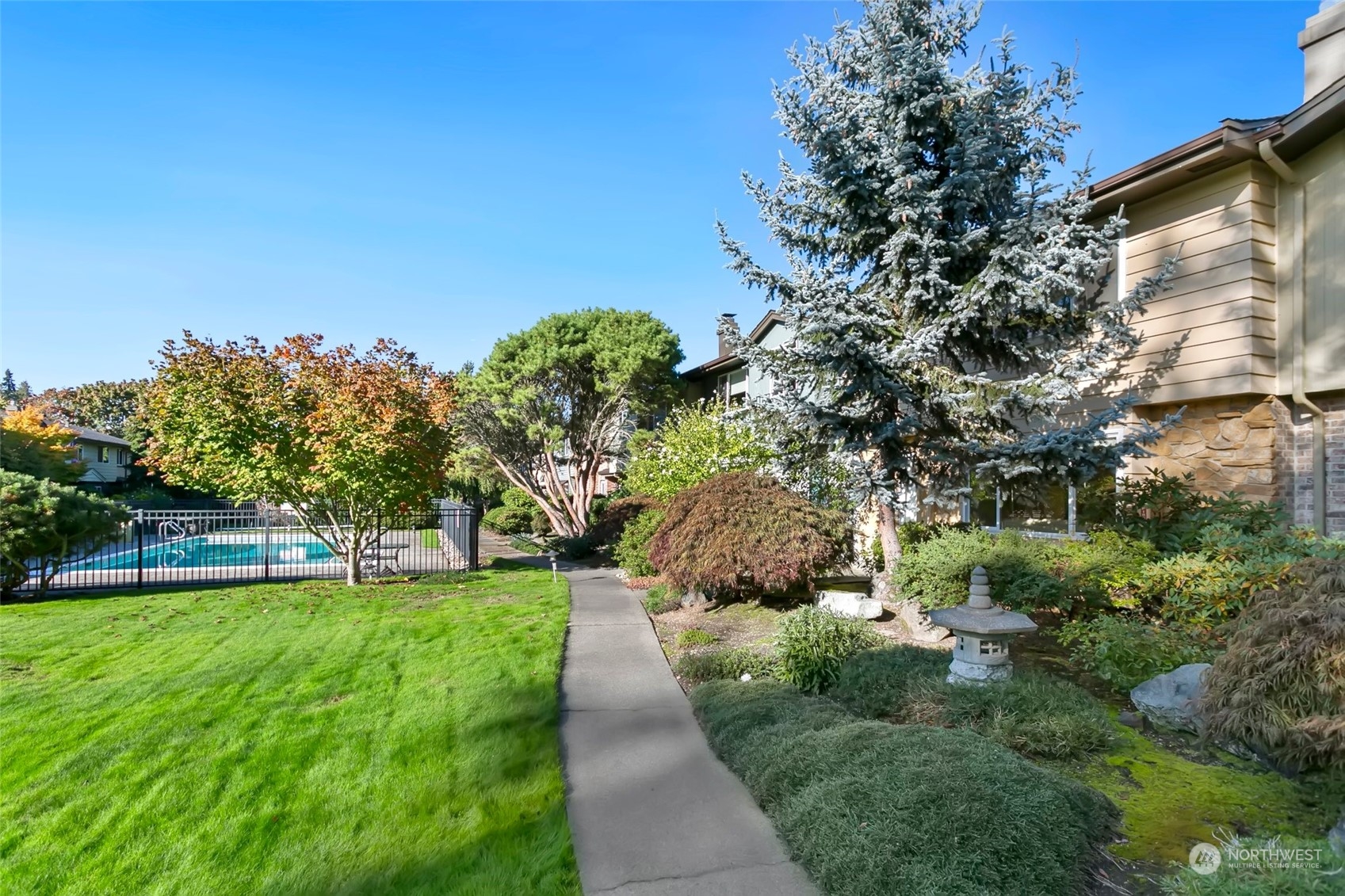 a view of a backyard with a garden