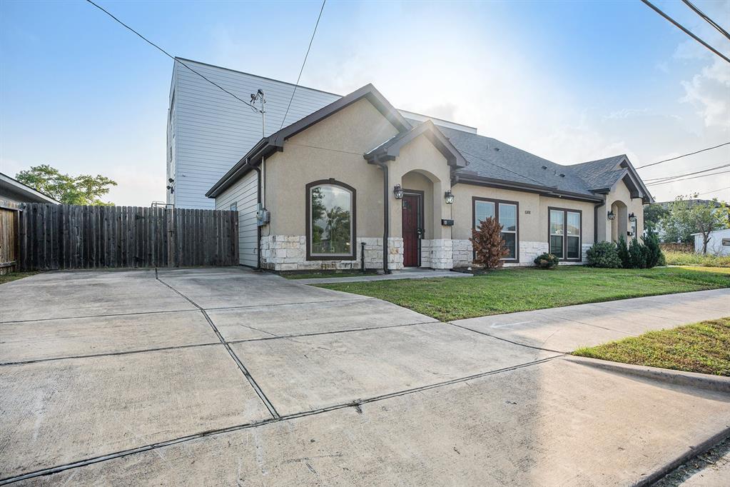 a front view of house with yard