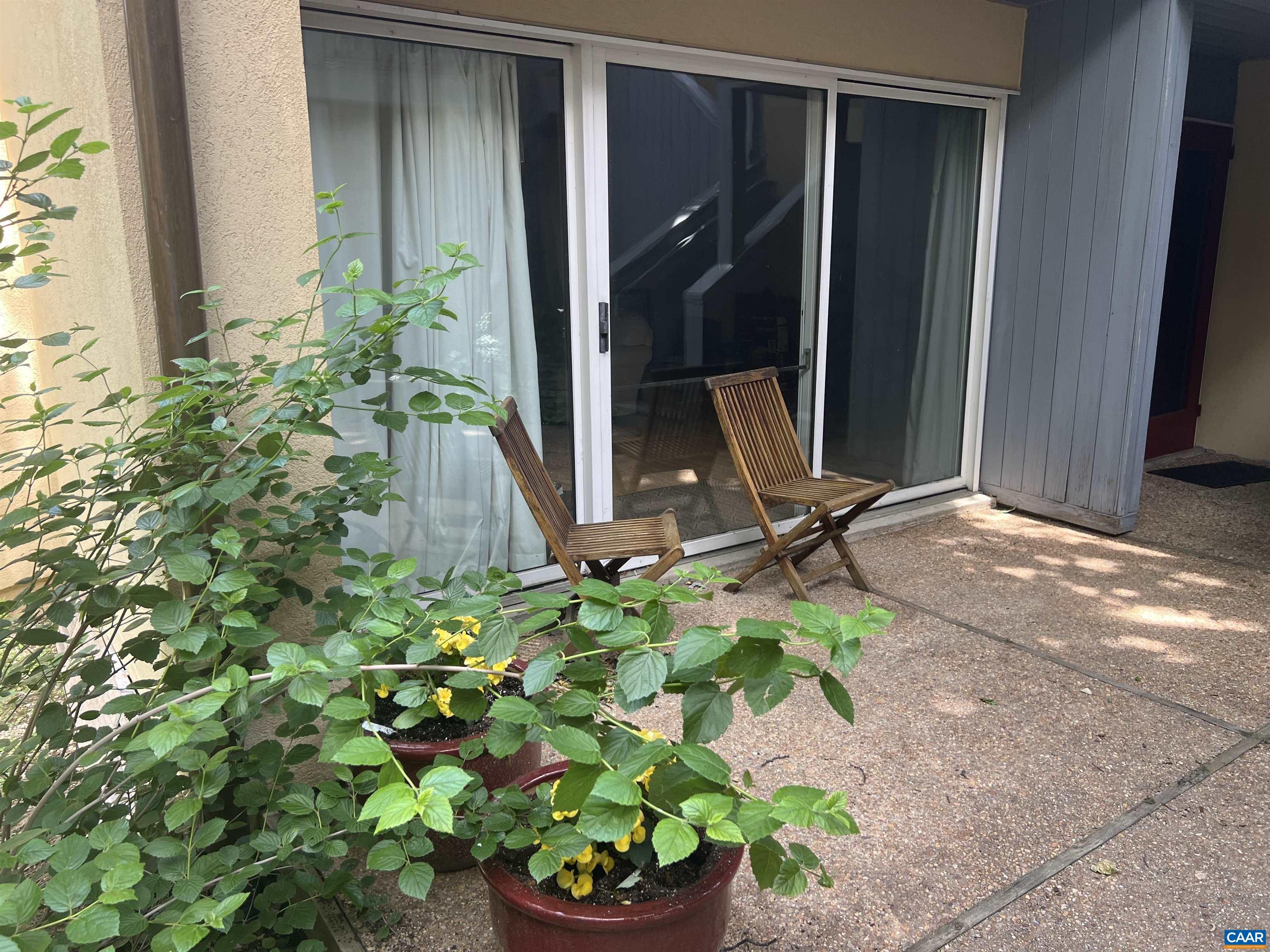 a view of a backyard with a outdoor space