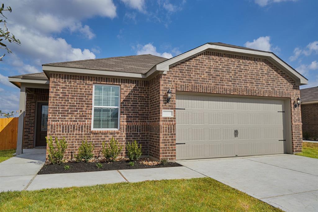 a view of a house with garage