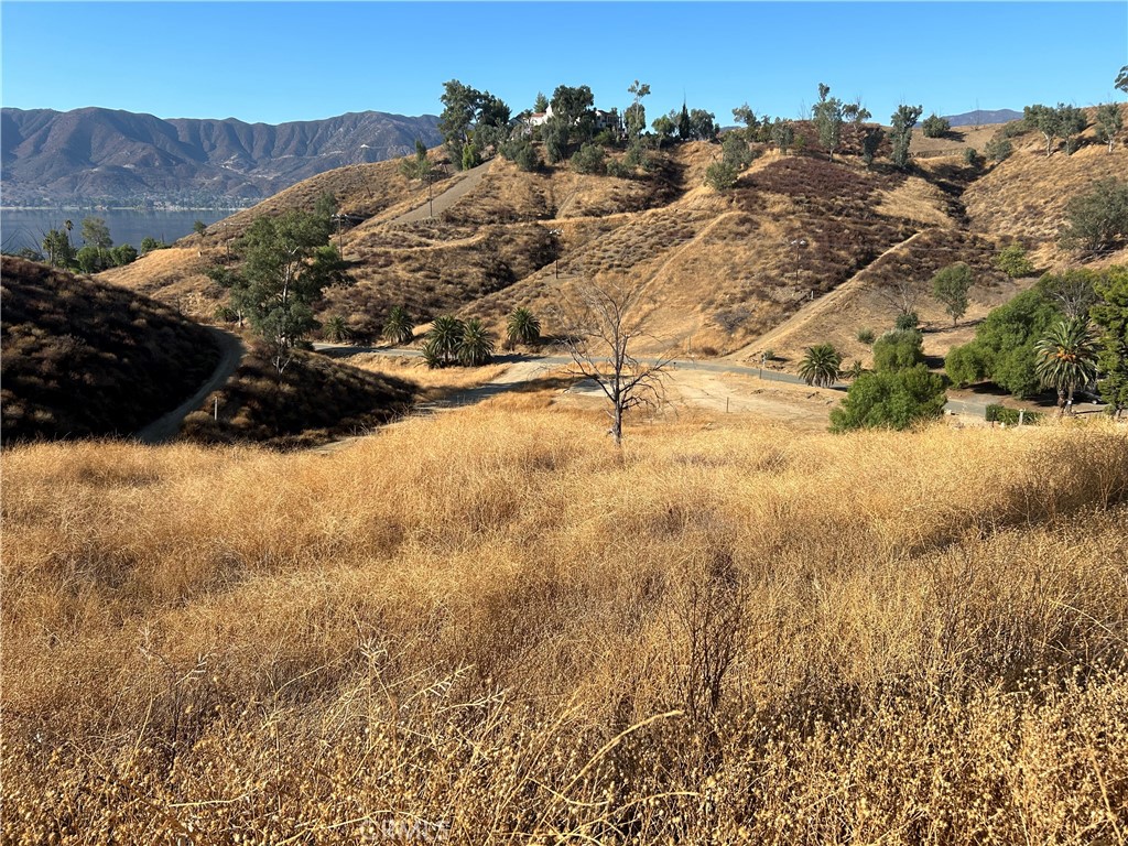 an aerial view of mountains in the background