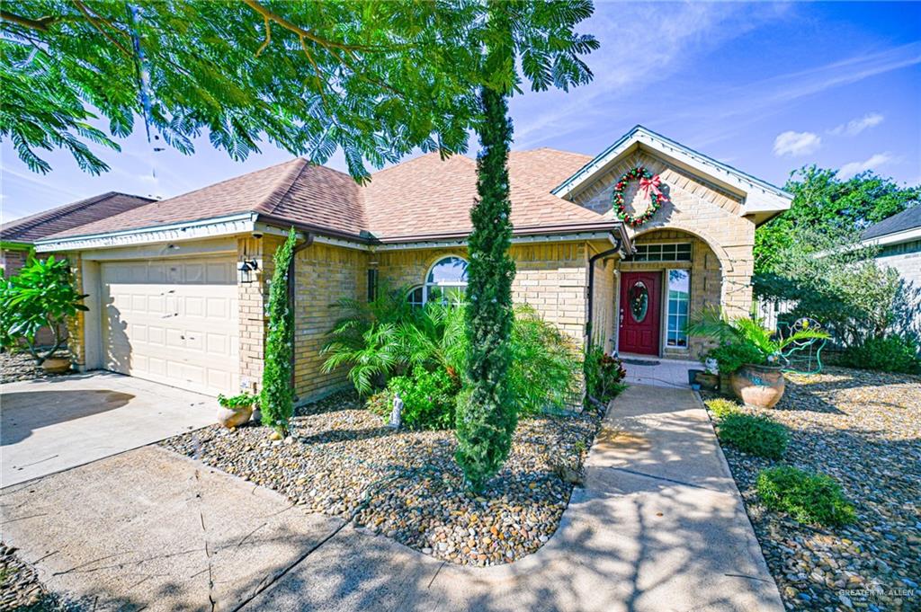 Ranch-style home with a garage