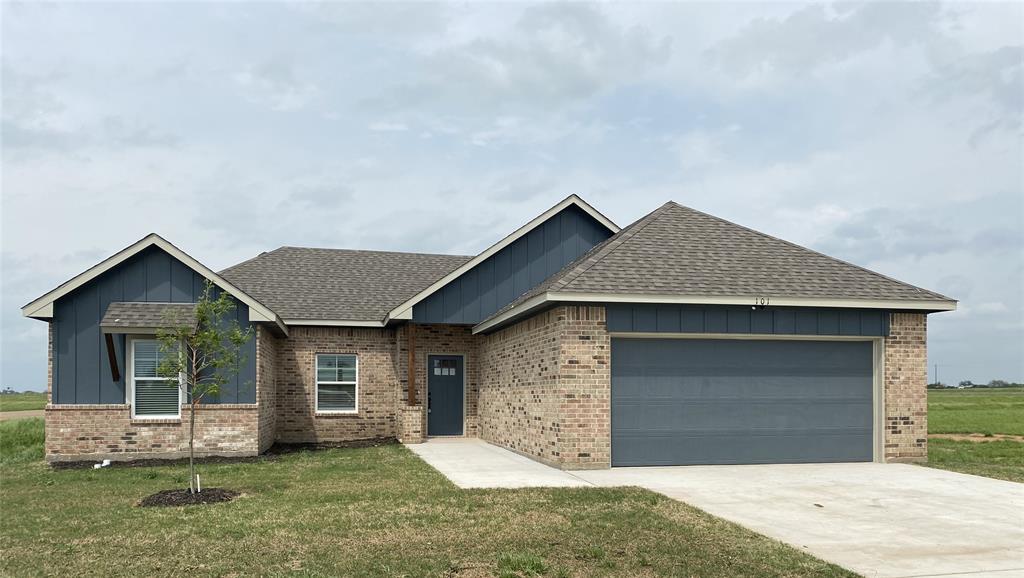 Plan 1501 - Elevation A in Seeley Town Brick 