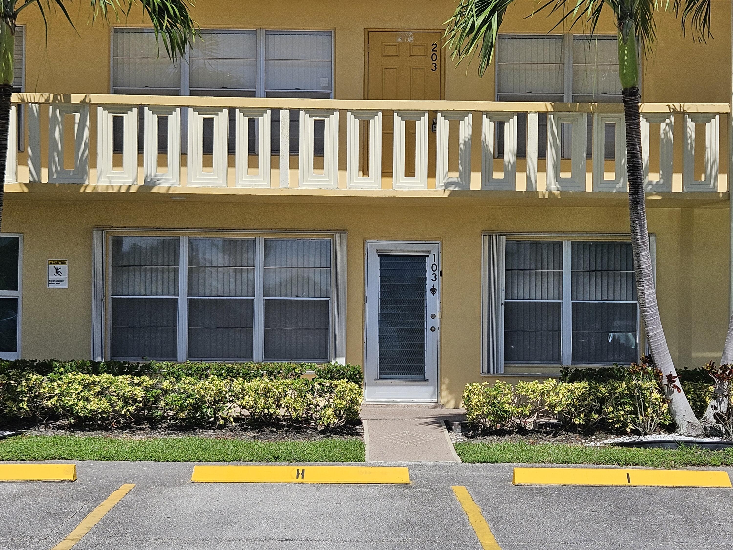 a view of a house with swimming pool