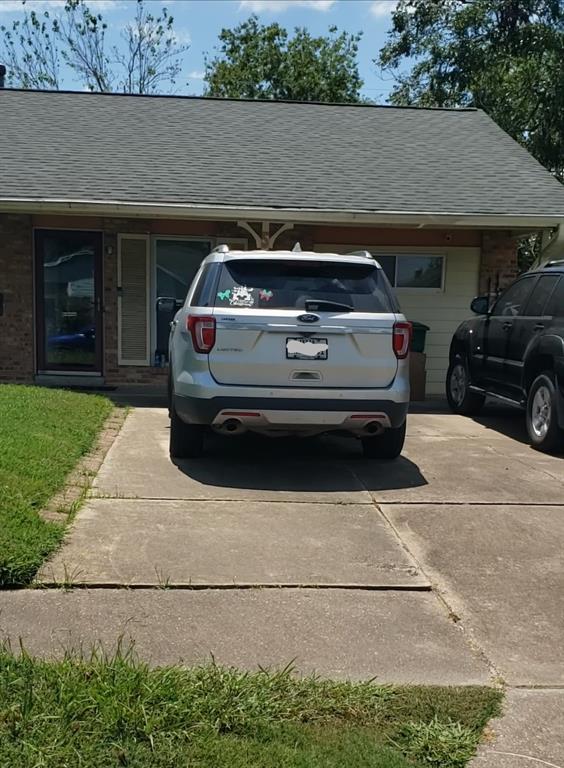 a car parked in front of a house