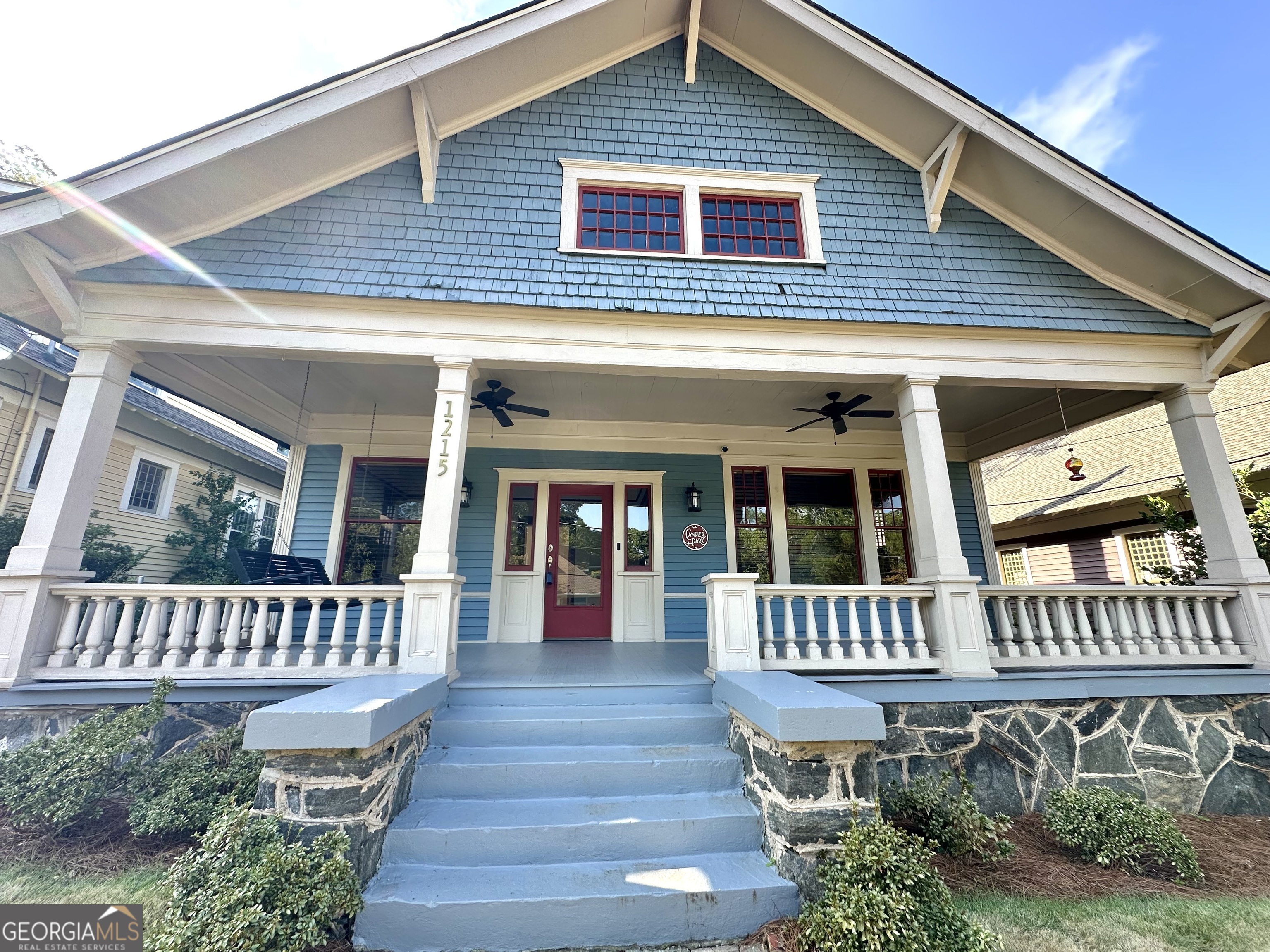 a front view of a house with a porch