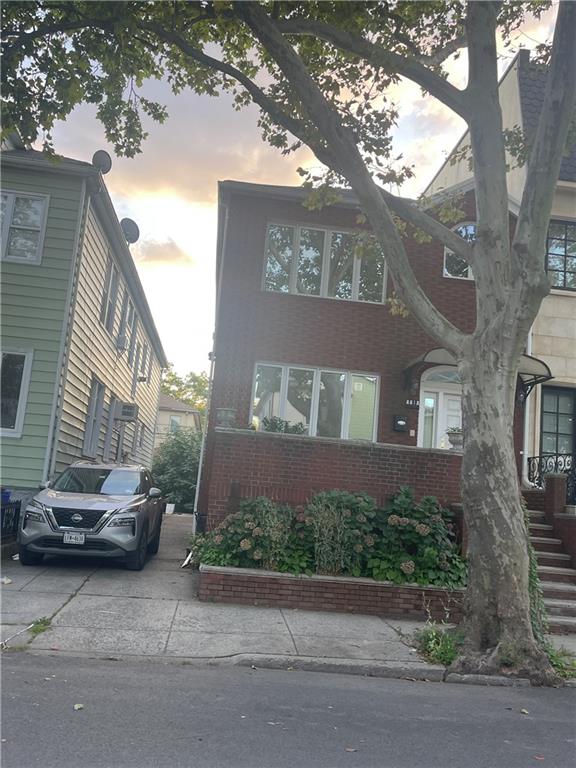 a car parked in front of a house