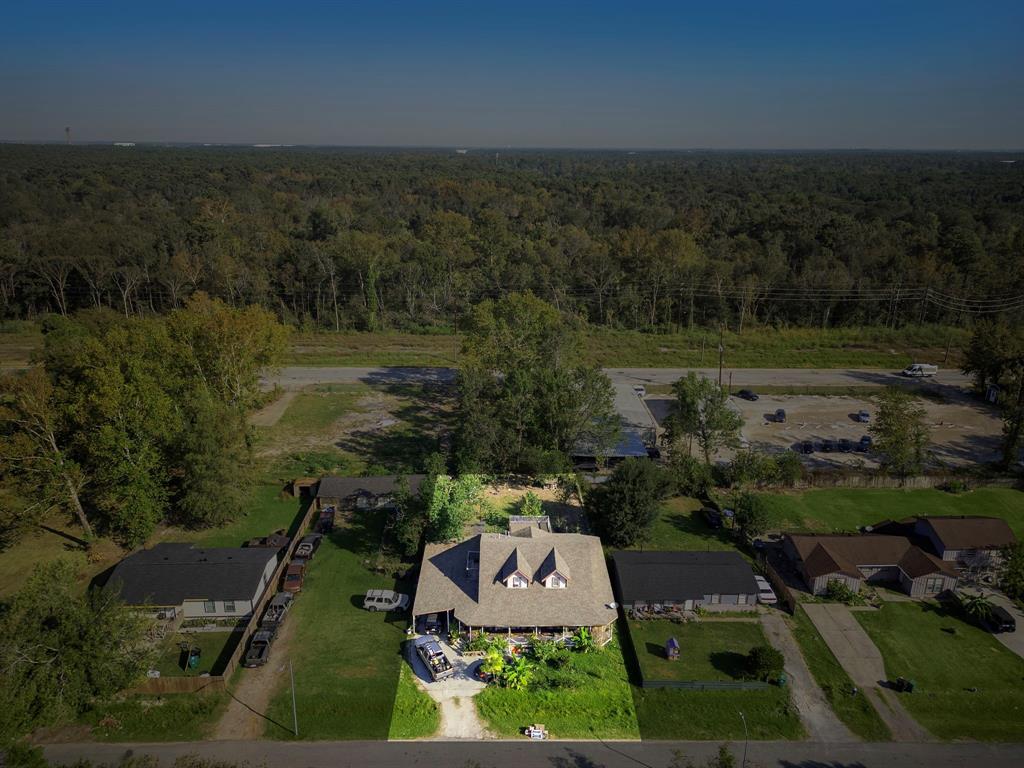 an aerial view of residential house with outdoor space