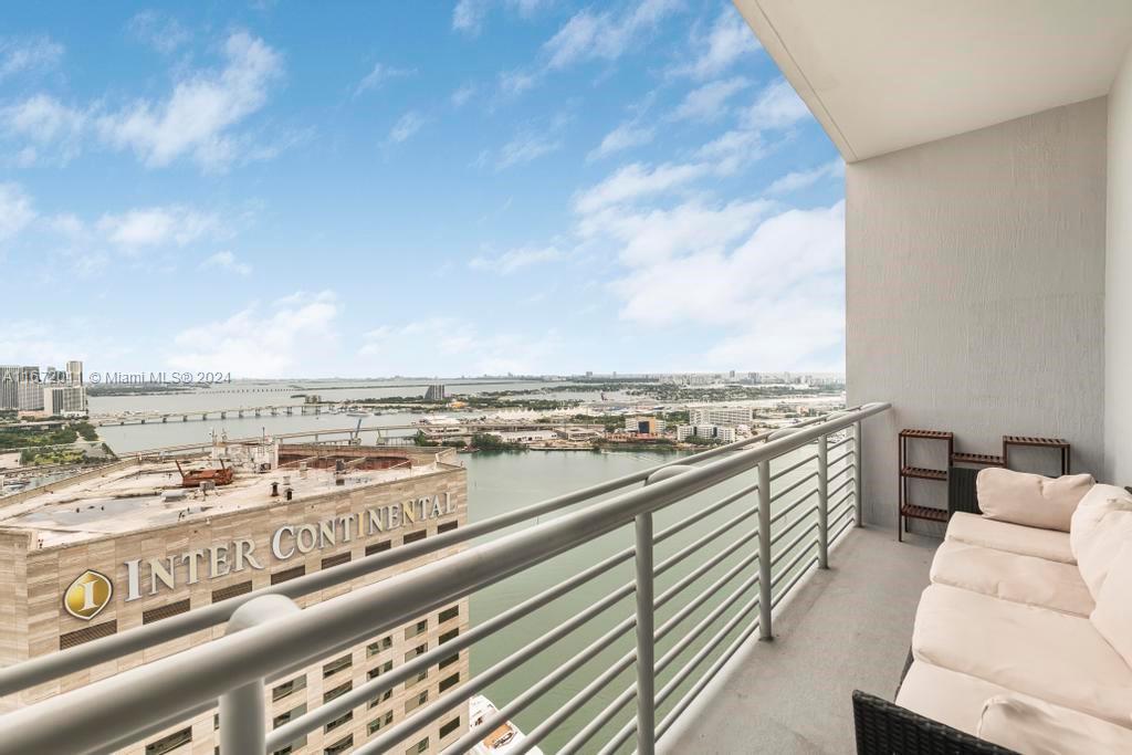 a view of a terrace with a city view