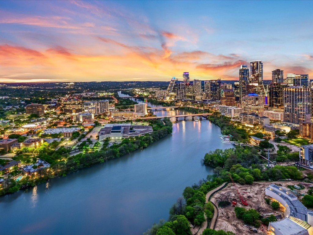 a view of a lake with a city