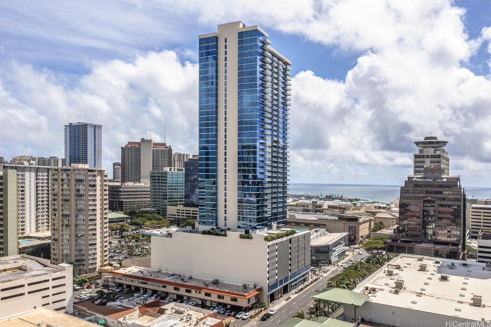 a view of a city with tall buildings