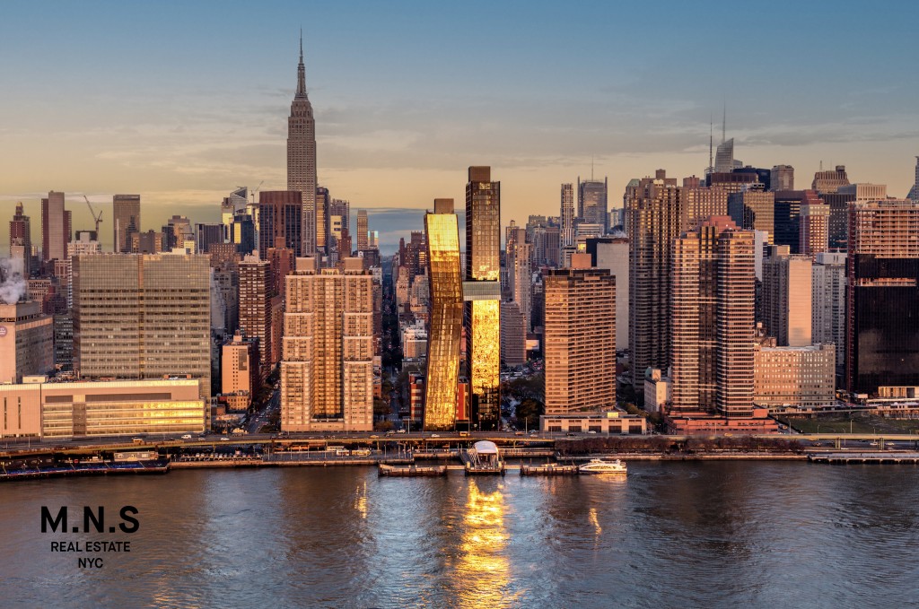 a view of a city with tall buildings