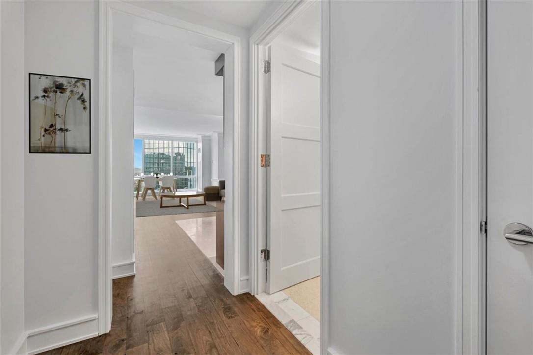 a view of a hallway with the view and living room