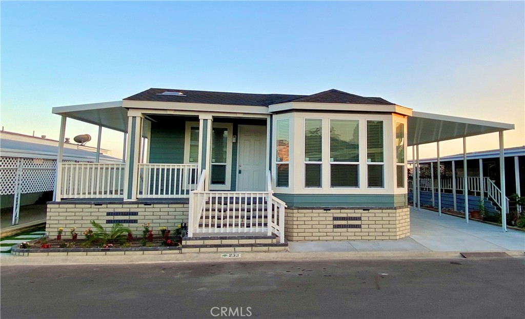 a front view of a house with a porch