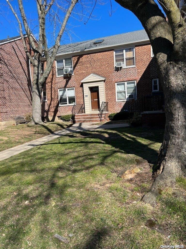 a view of pool with a yard