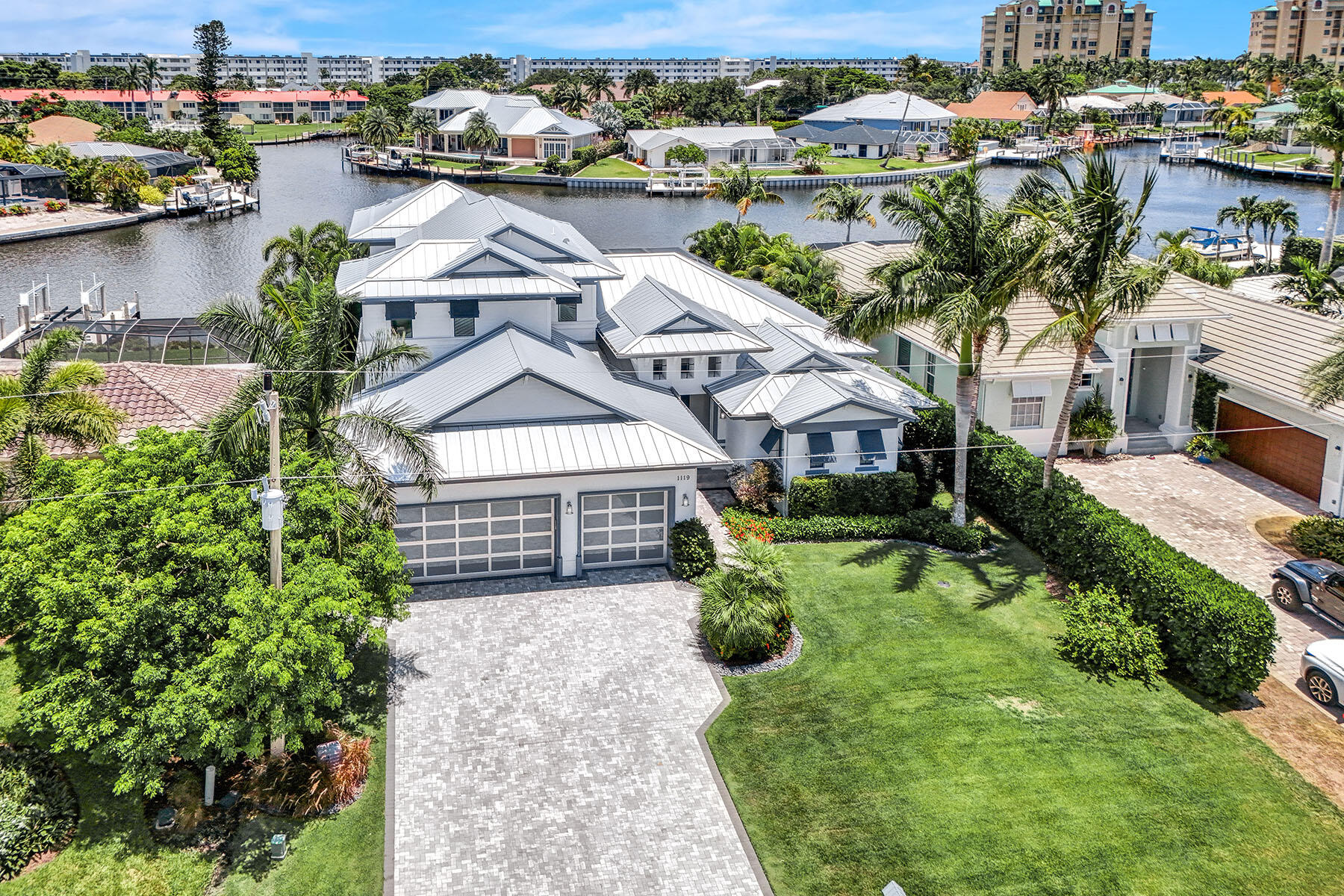 an aerial view of a house with a ocean view