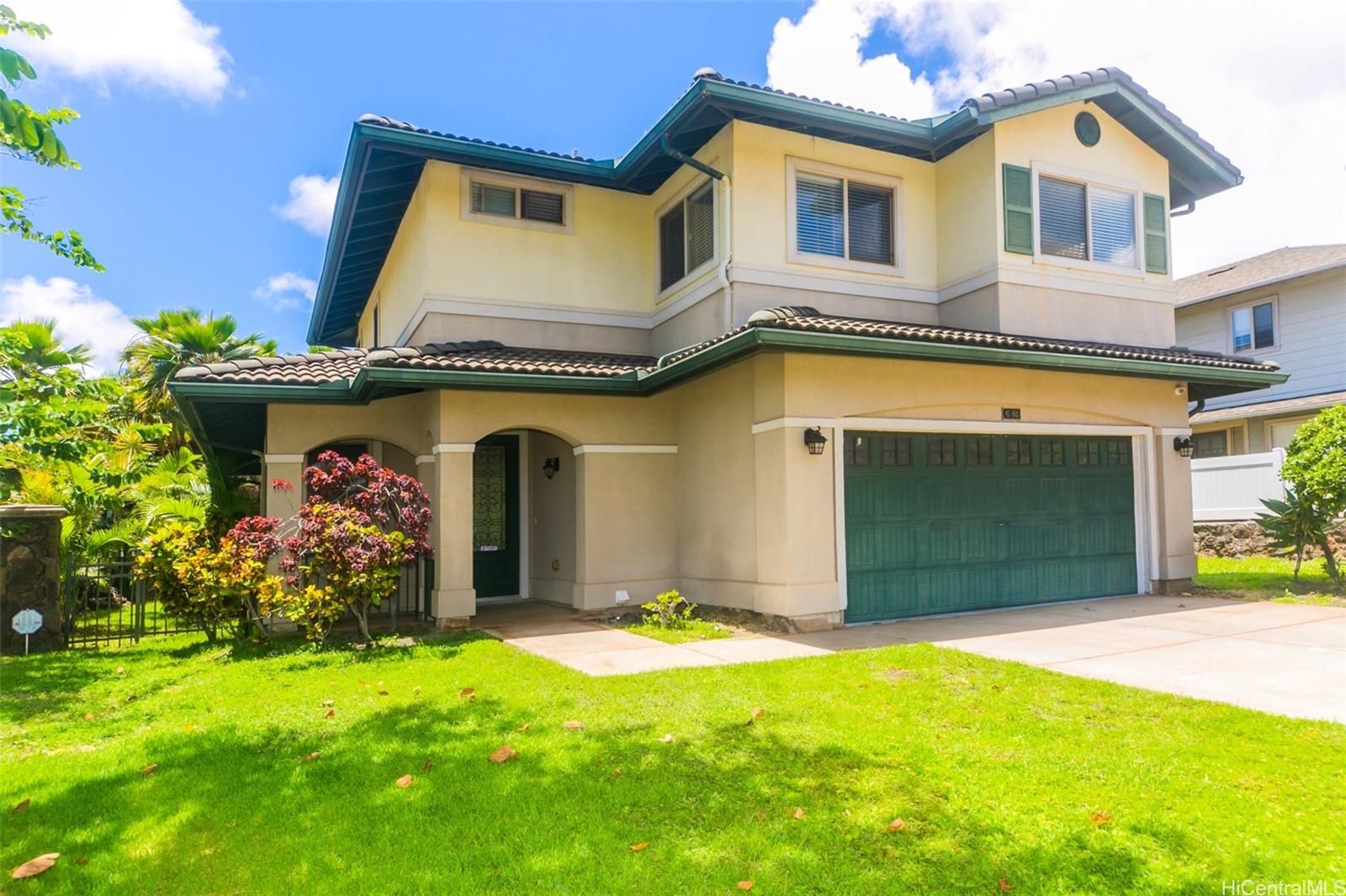 a front view of a house with yard