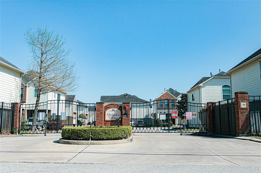 a front view of a houses with street