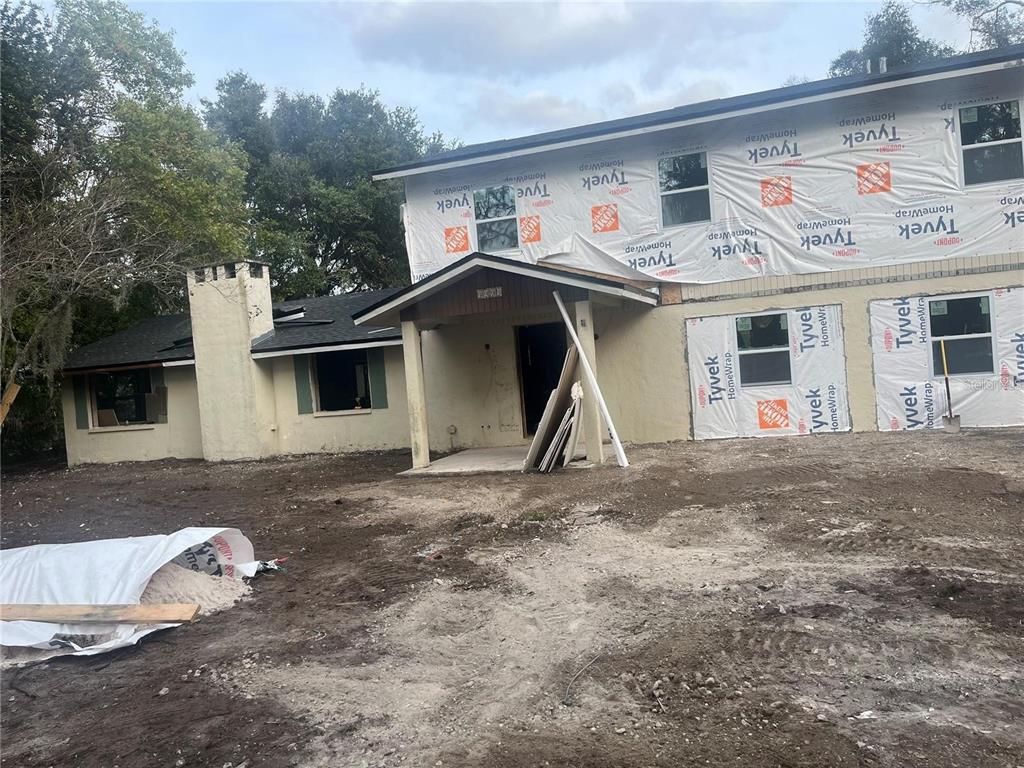 a view of a house with a patio