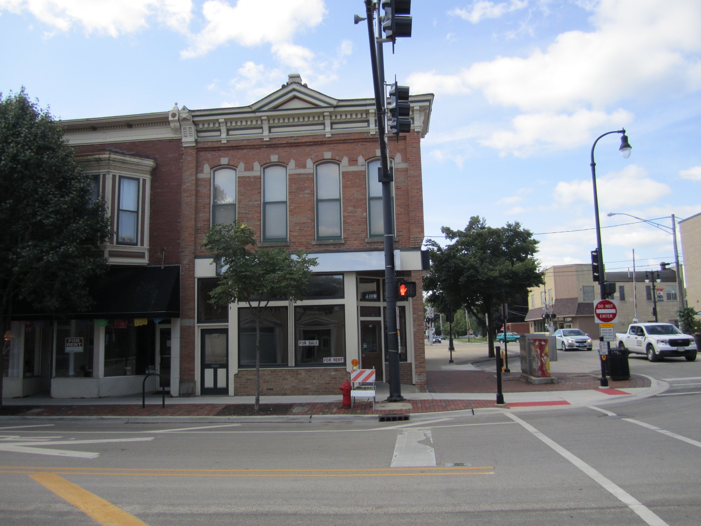 a view of a building with a street