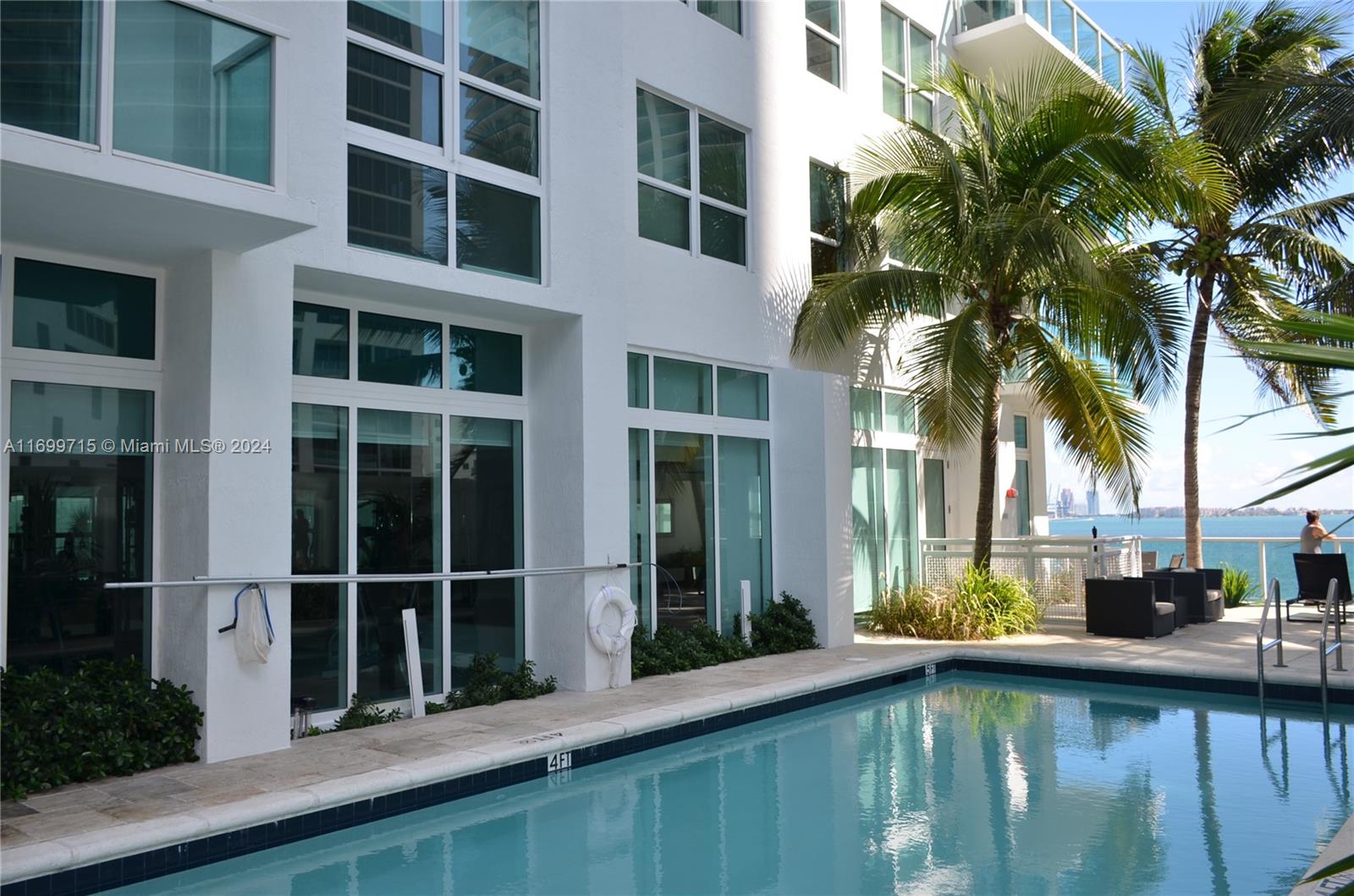 a view of a house with a swimming pool