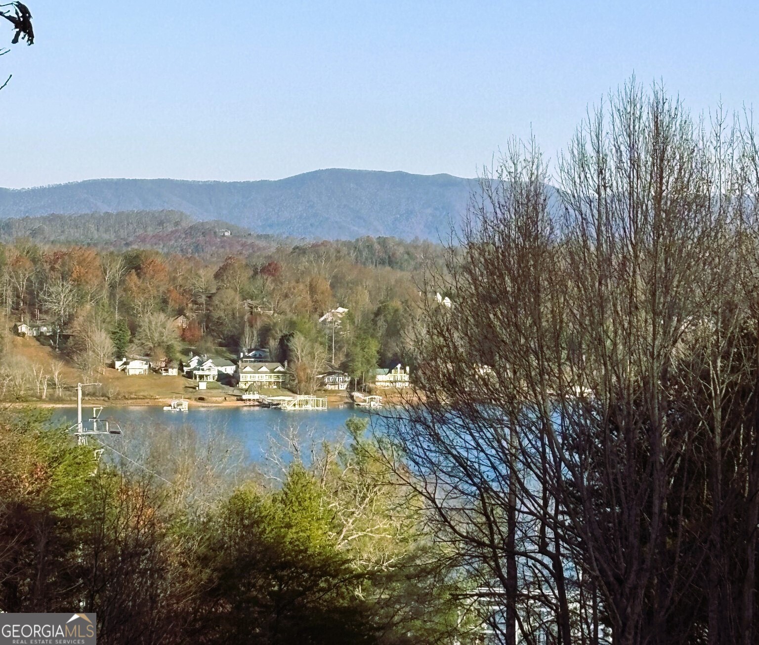 a view of lake with mountain