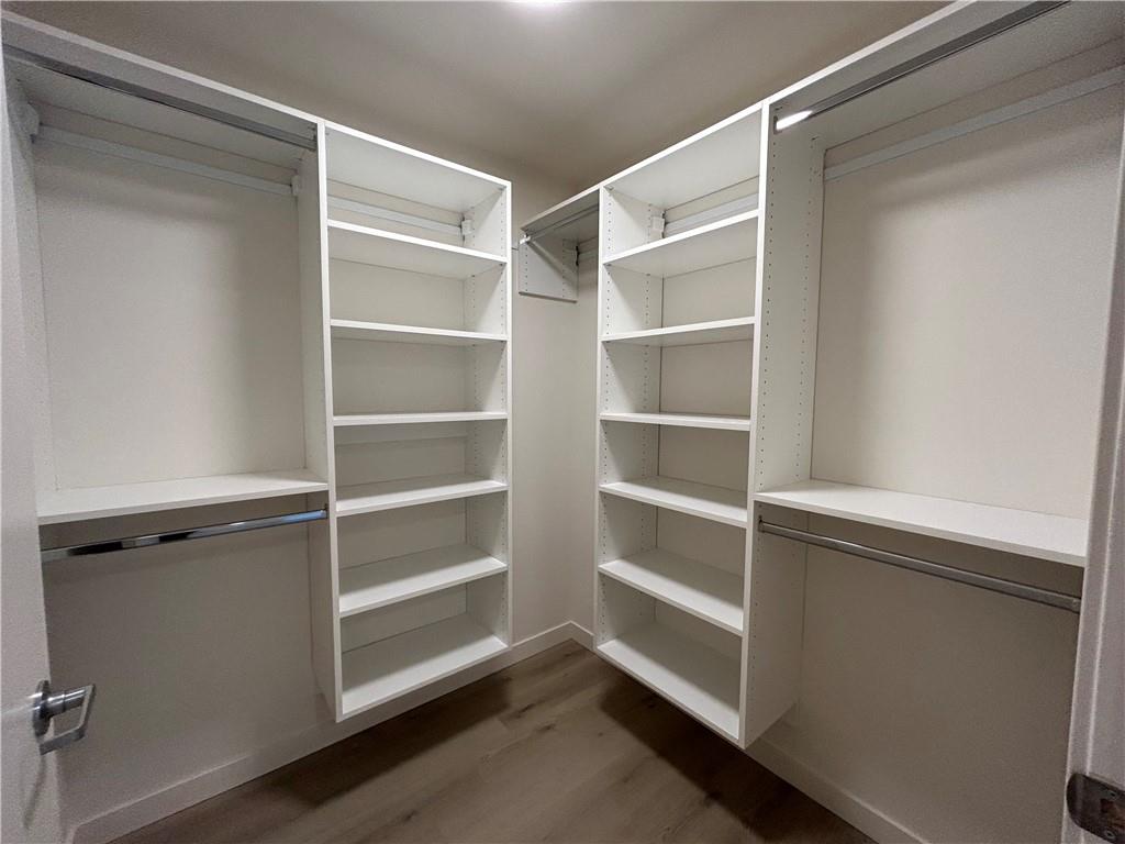 a view of an empty walk in closet