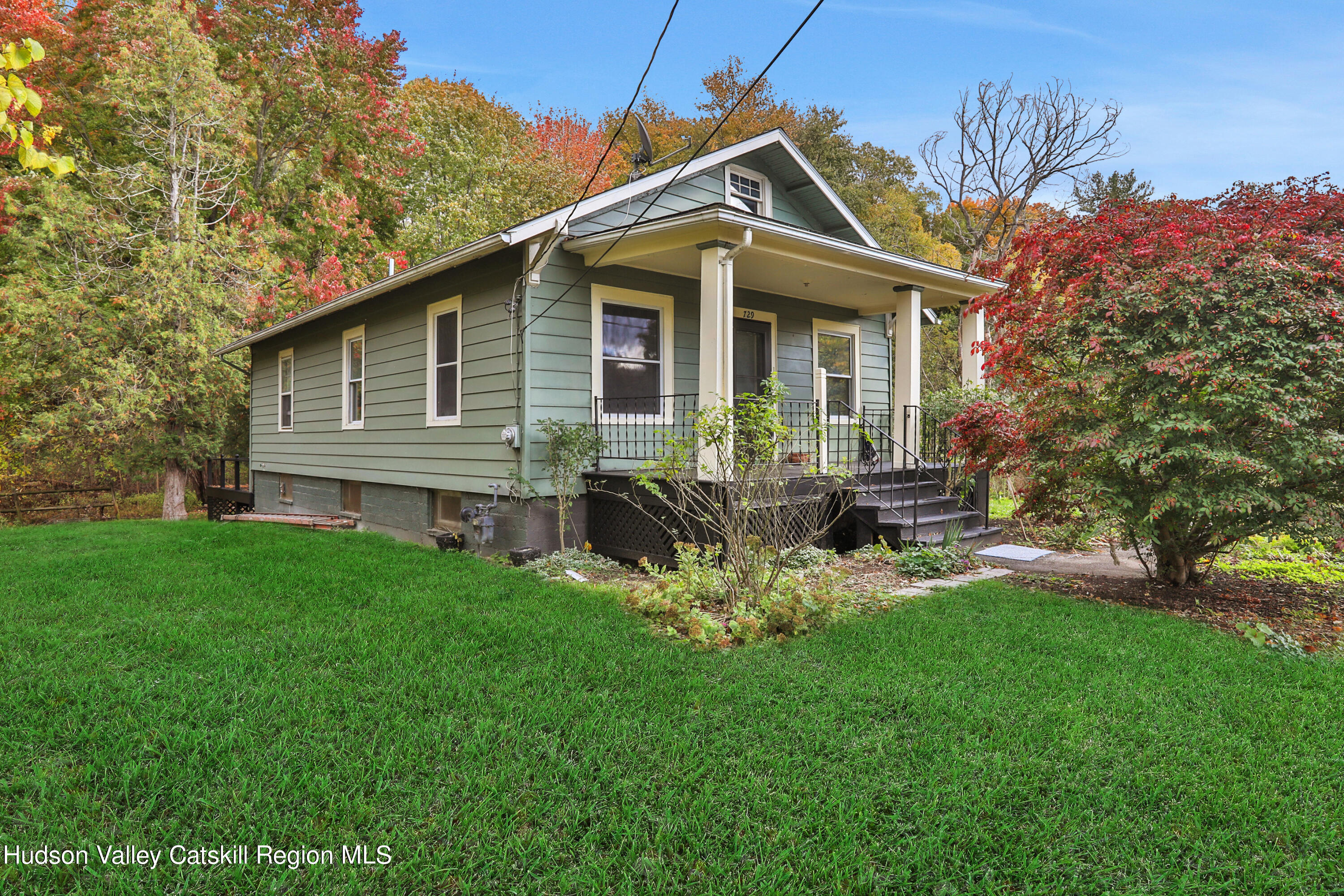 a front view of a house with patio