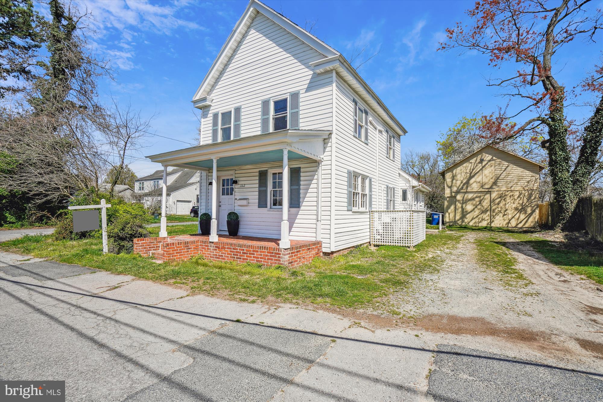 a view of front of house with a yard