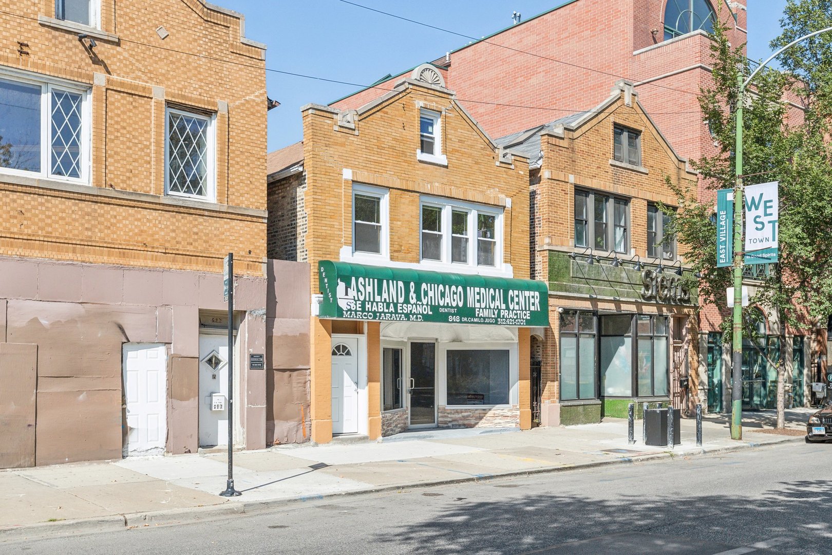 a front view of a brick building