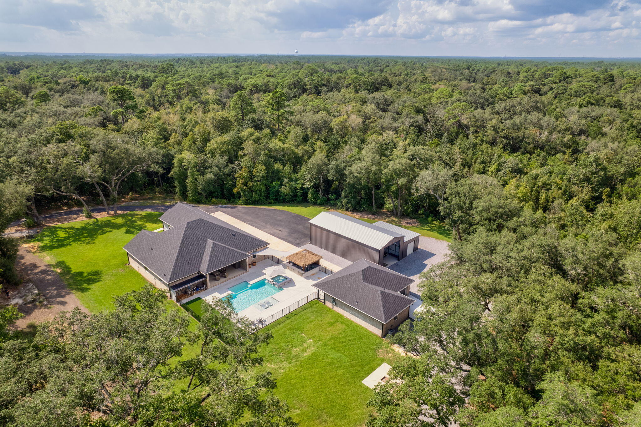 an aerial view of a house with a garden