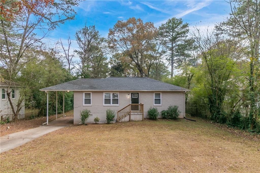 front view of house with a yard