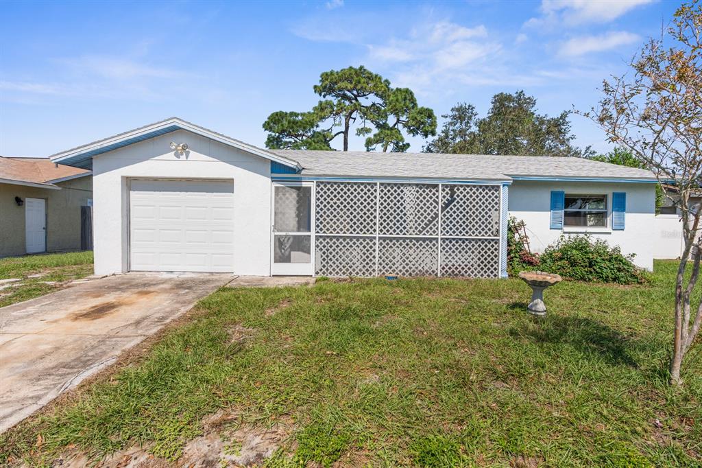 front view of a house with a yard