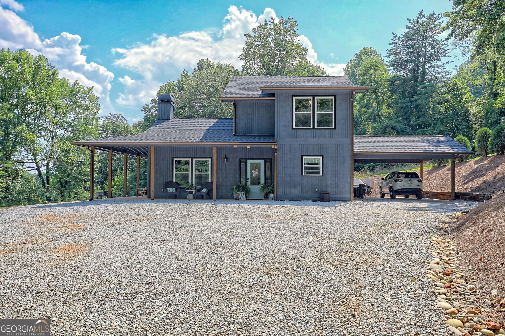 front view of a house with a yard