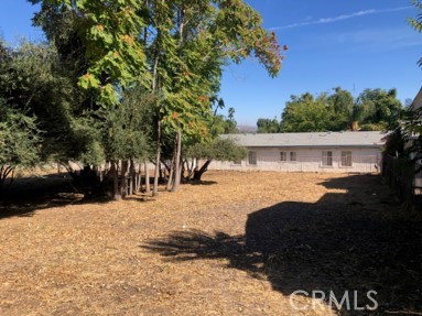 a view of house with outdoor space