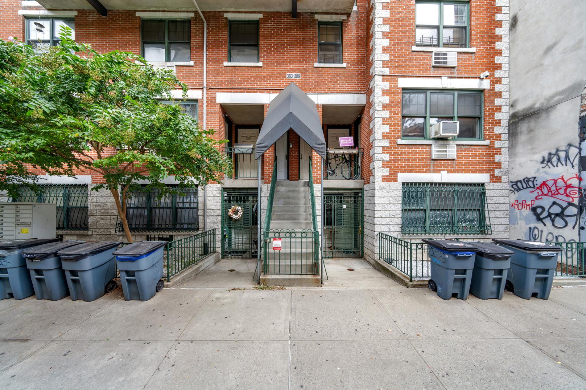 a front view of a house with barbeque area