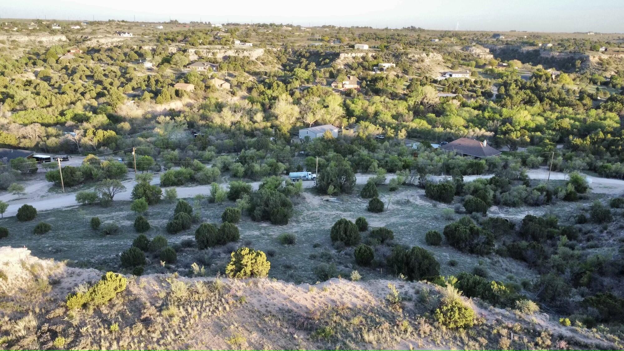 an aerial view of residential house with outdoor space