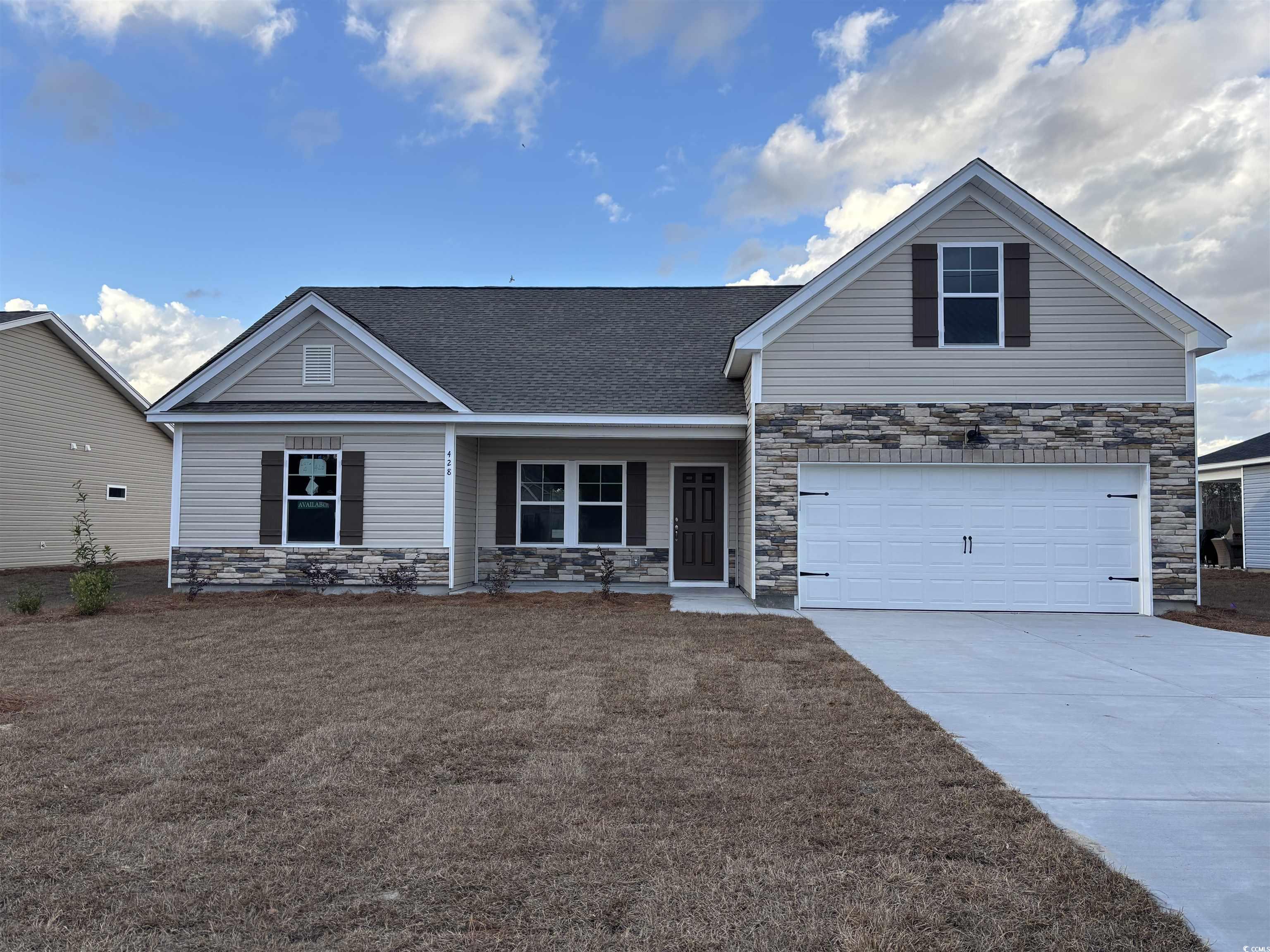 View of front of home with a garage