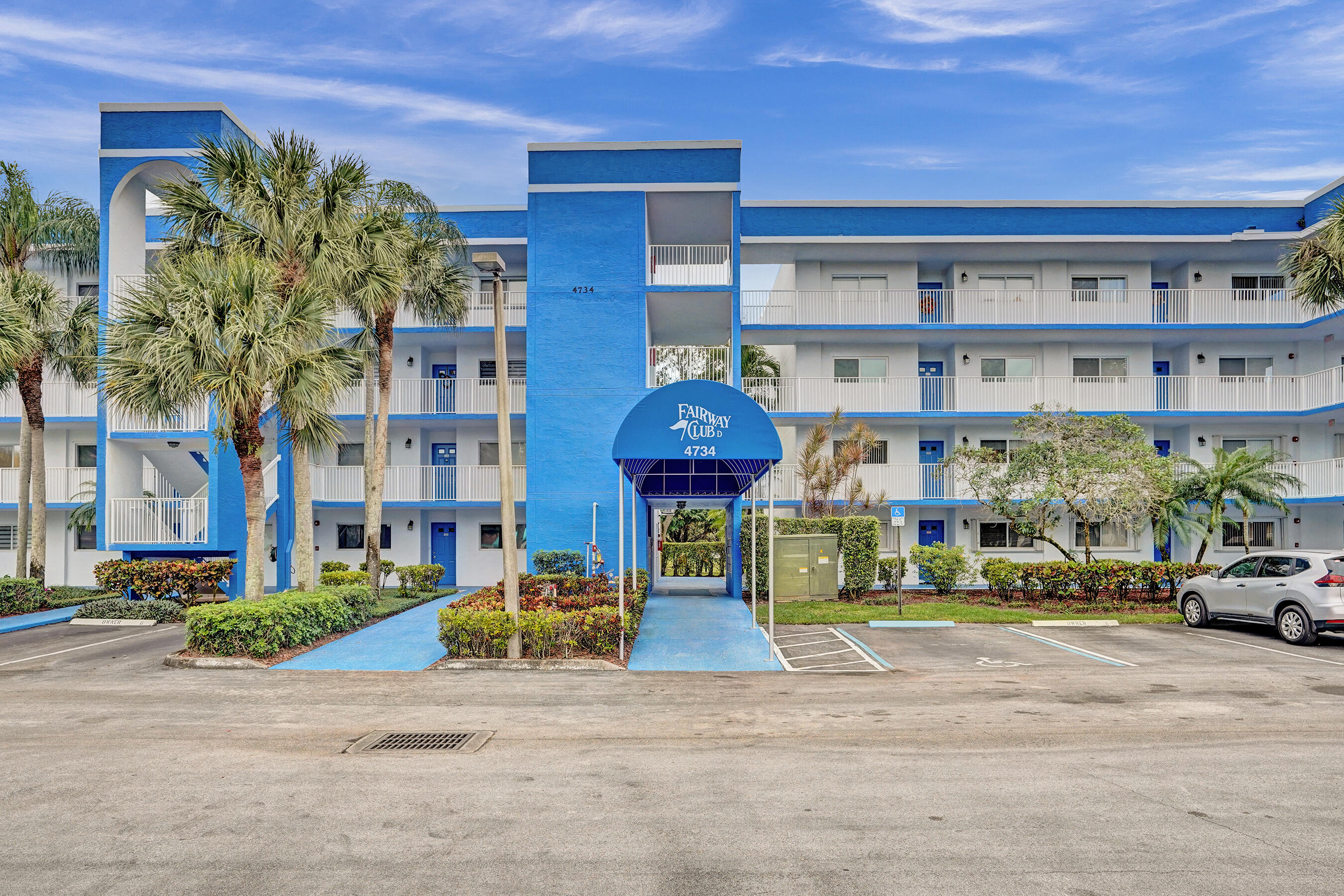 a front view of a building with street view