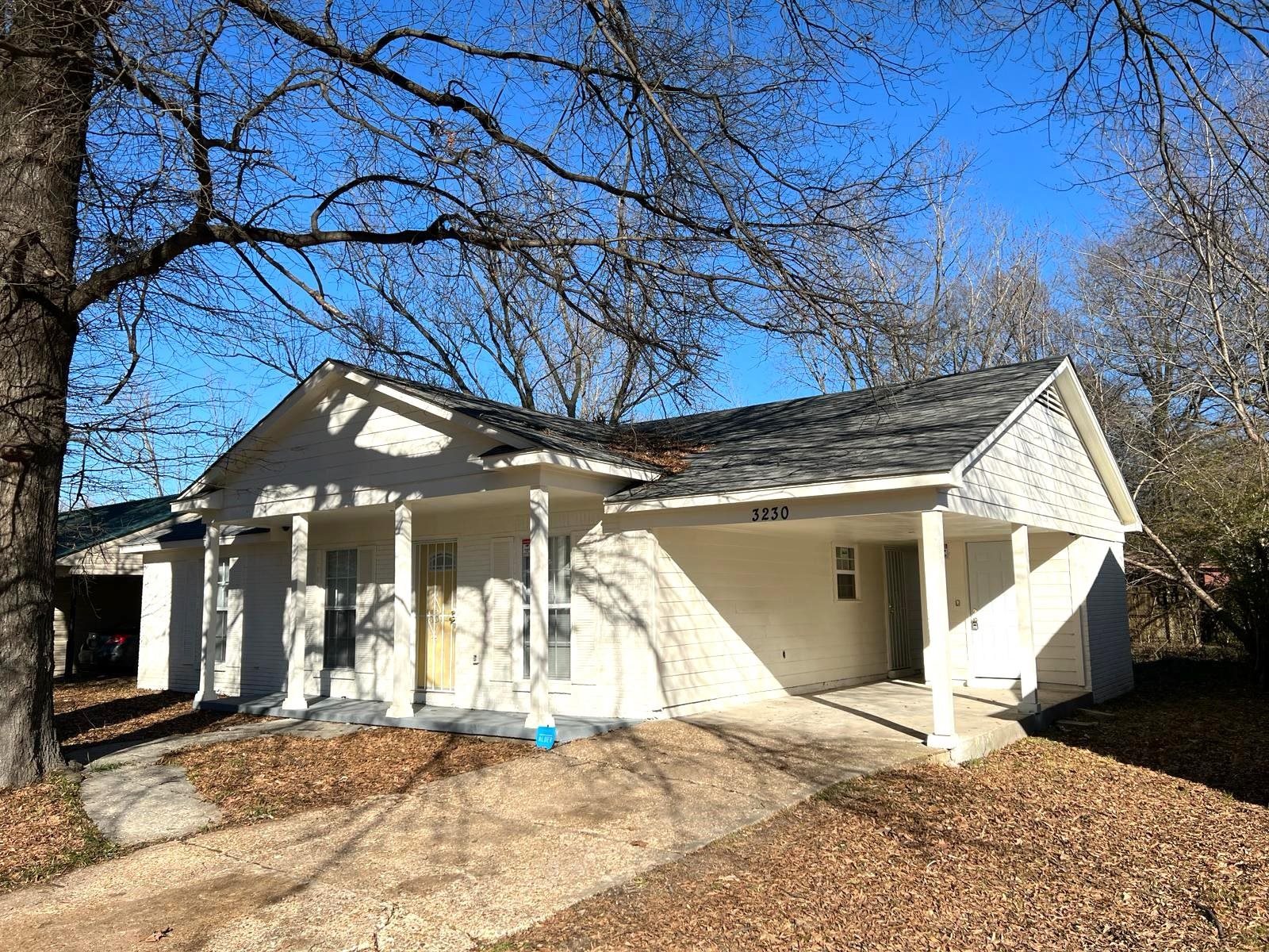 a view of a house with a snow in the yard