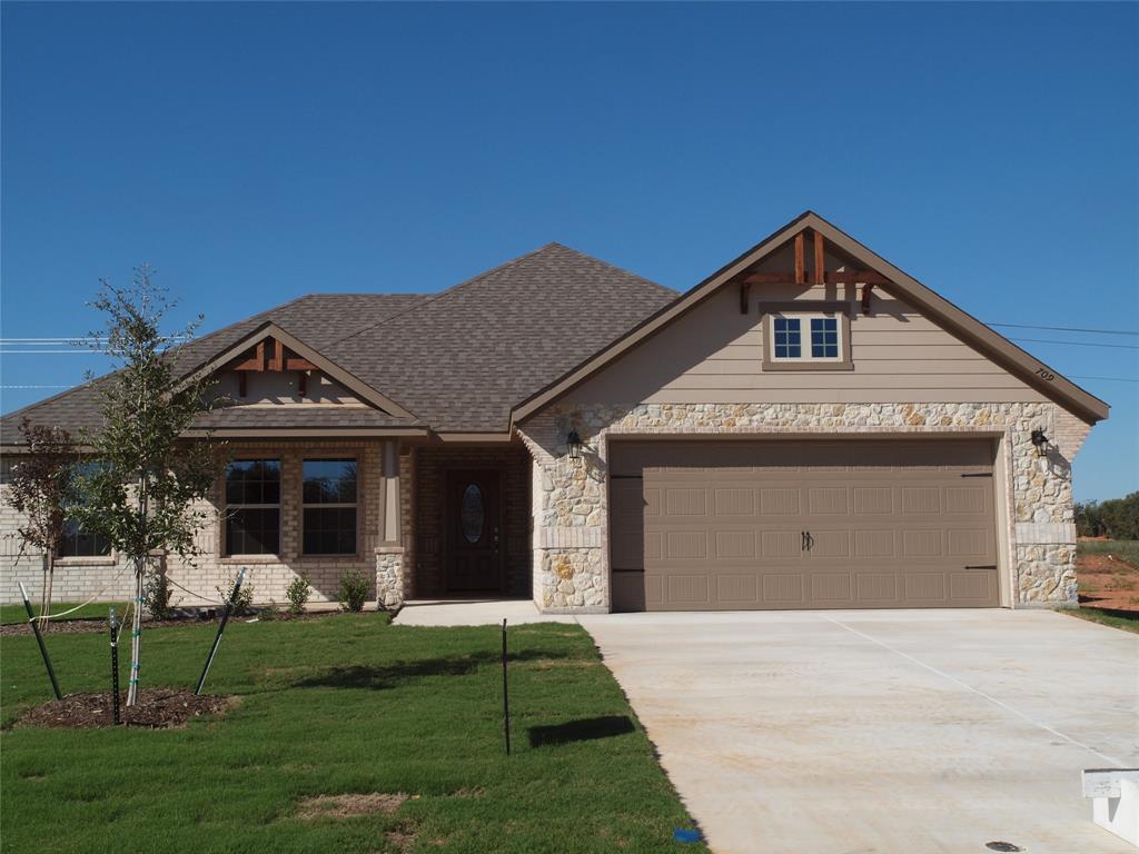 a front view of house with yard