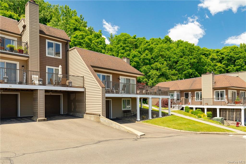 a house with trees in the background