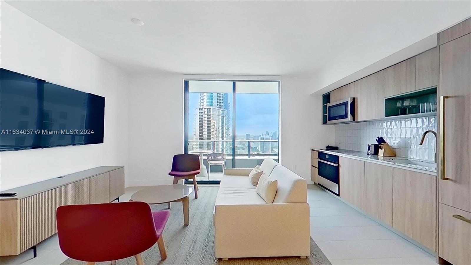 a living room with furniture window and flat screen tv