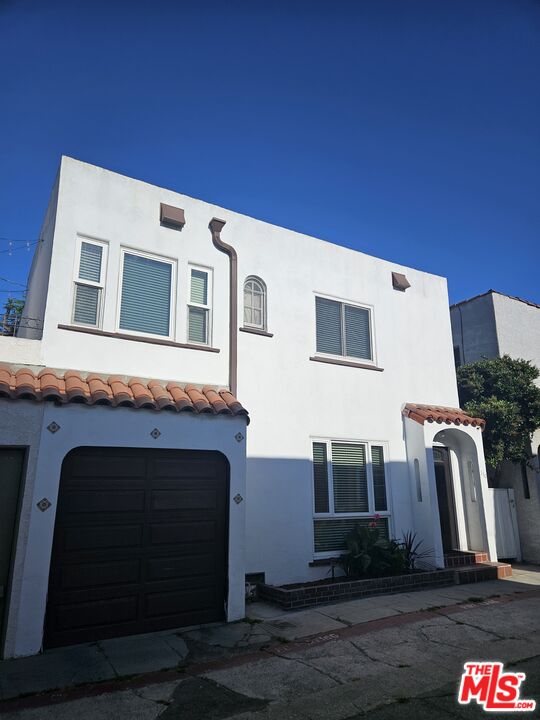 a front view of a house with yard