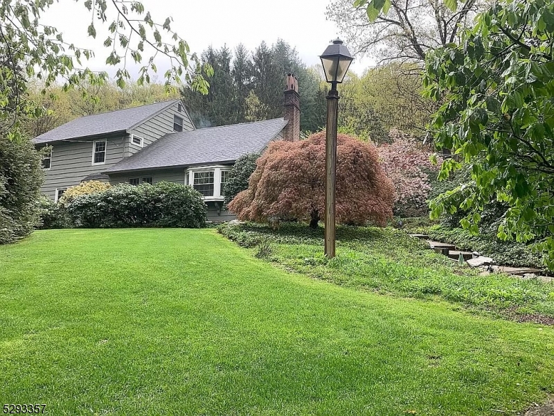 a house view with a garden space