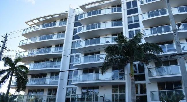 a front view of multi story residential apartment building