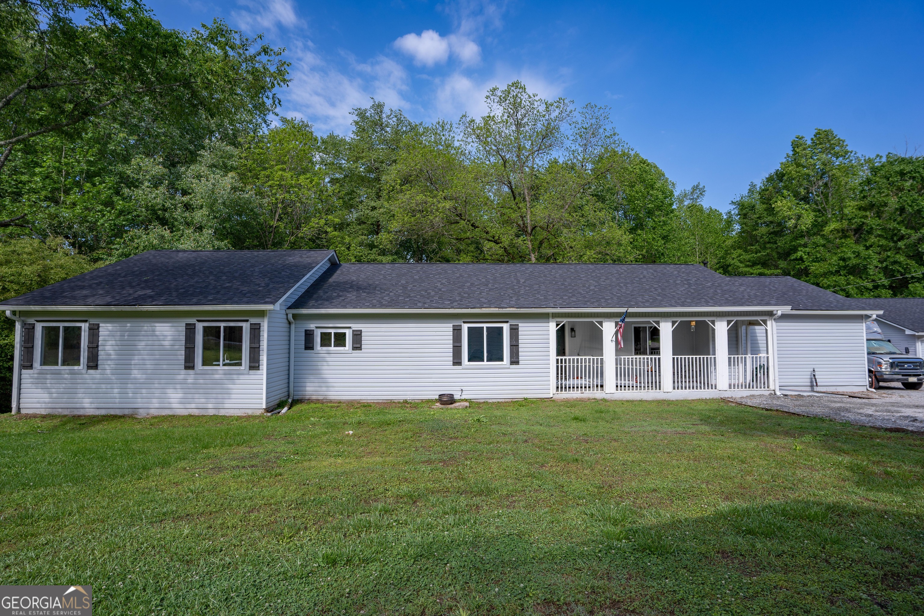 front view of a house with a yard