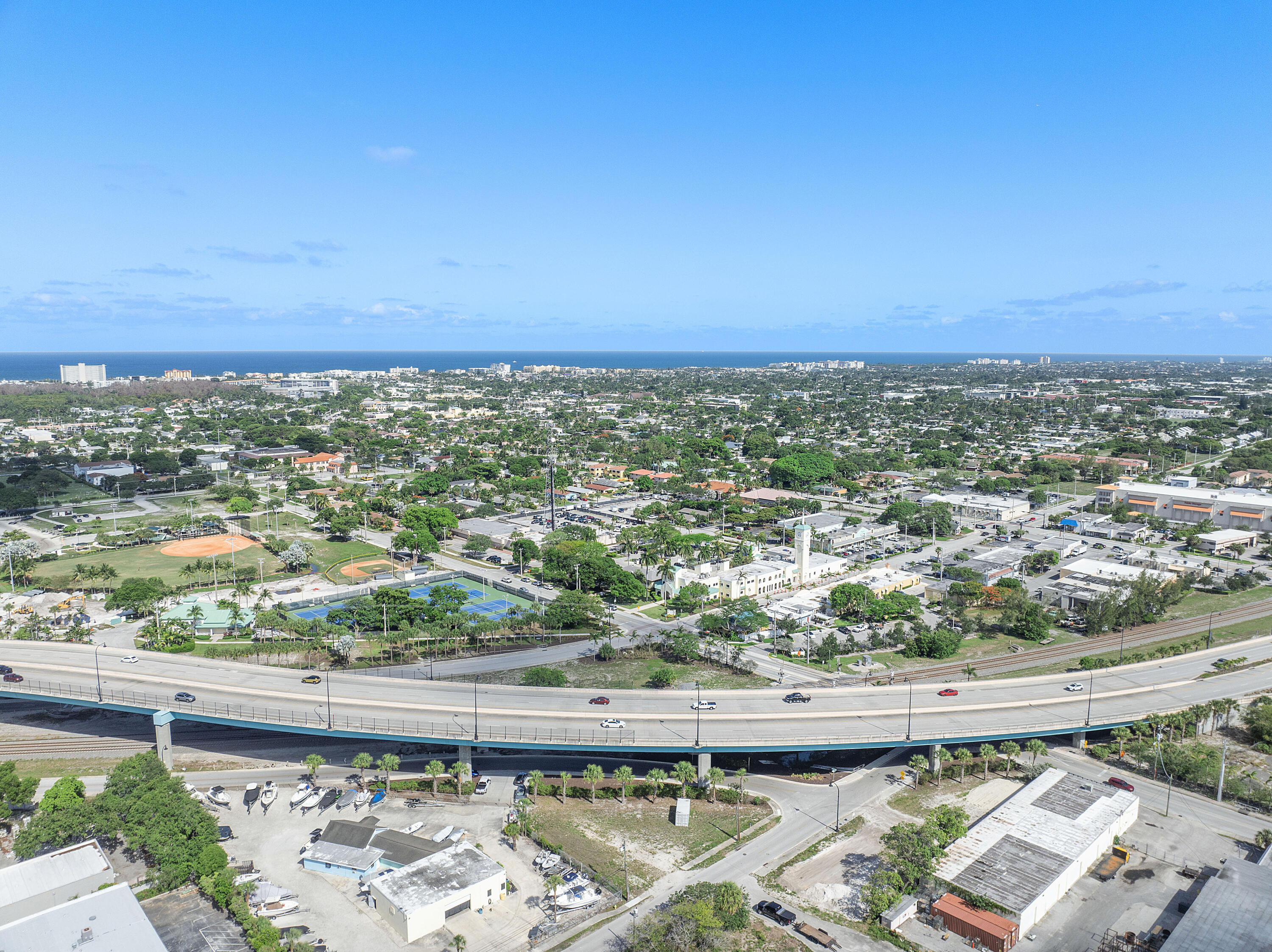 an aerial view of a city and ocean view