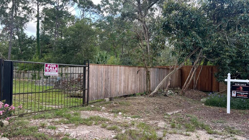 a view of a wooden fence