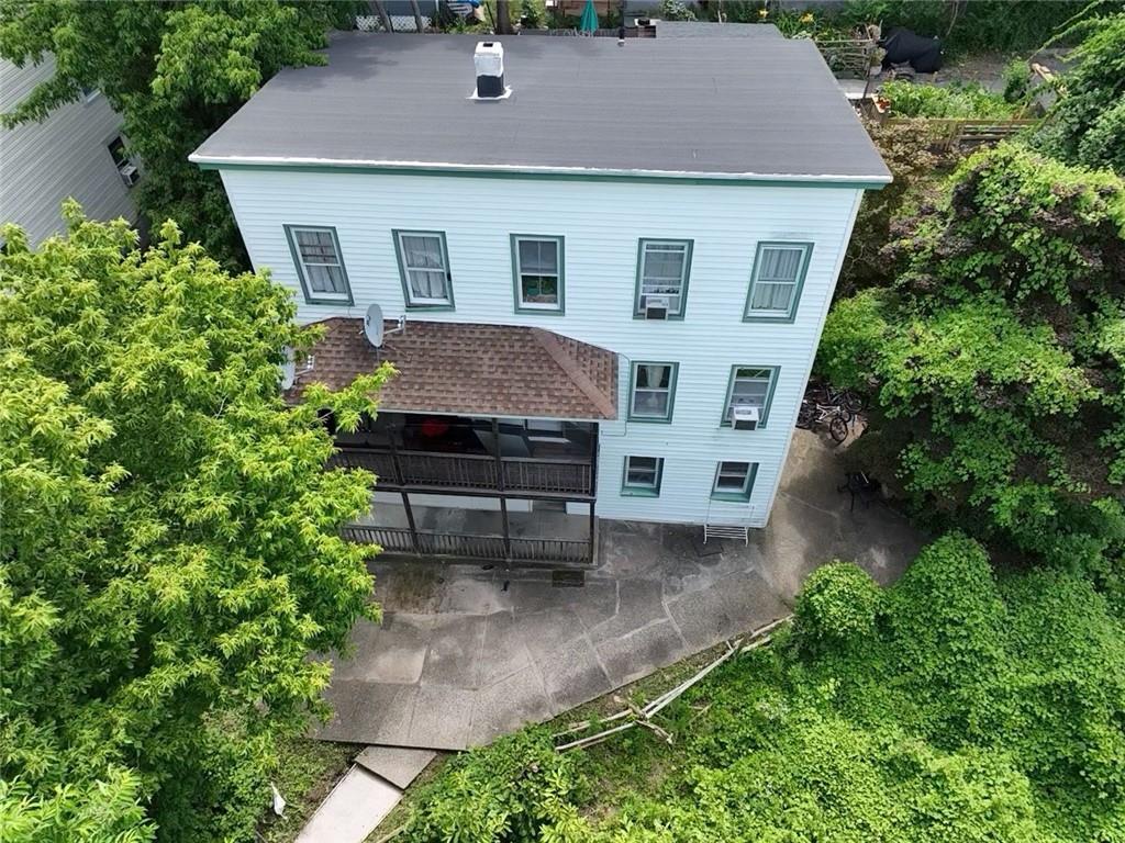 Rear view of house with a patio area